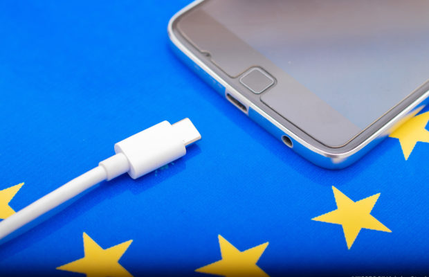 Close Up Mobile Phone Charger With Usb Type C Cord On Eu Flag